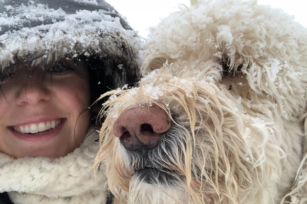 Fletcher, living with ITP in dogs, enjoying time in the snow with this dog mom and vet, Dr. Garlow.