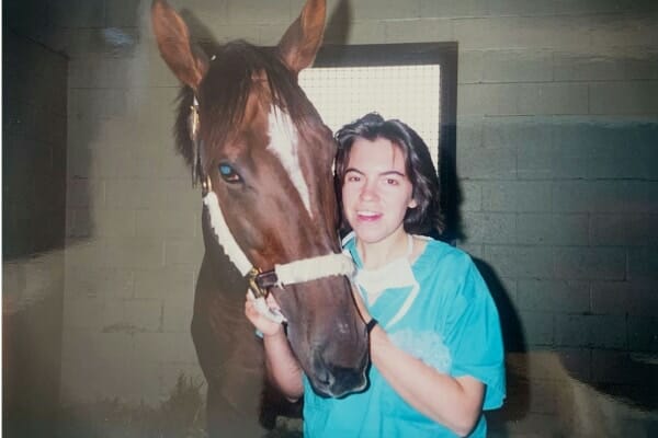 Vet student, Dr. Buzby, and a horse. The photo is from 25 years ago when animal orthotics was in its infancy.