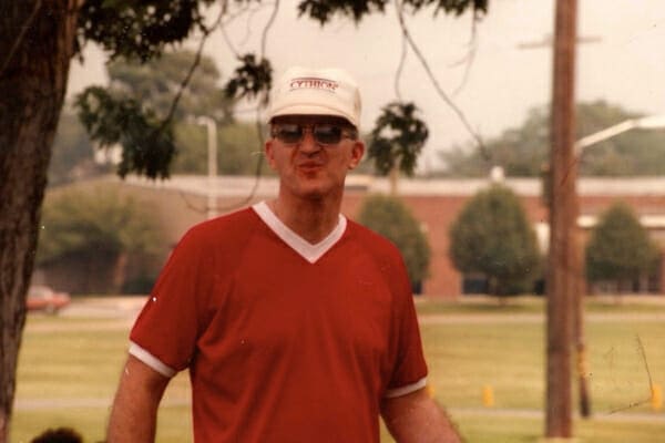 Dr. Buzby's father outdoors during the summer, photo