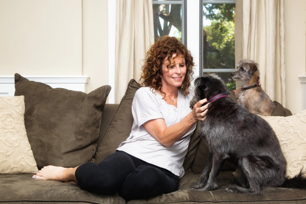 Owner monitoring her dog, a good practice for a dog with psychomotor seizures