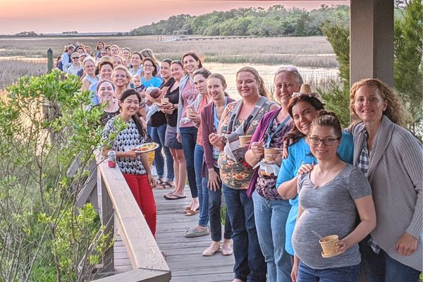 Group of veterinarians along with Dr. Buzby at a Veterinary Encouragement Conference outing